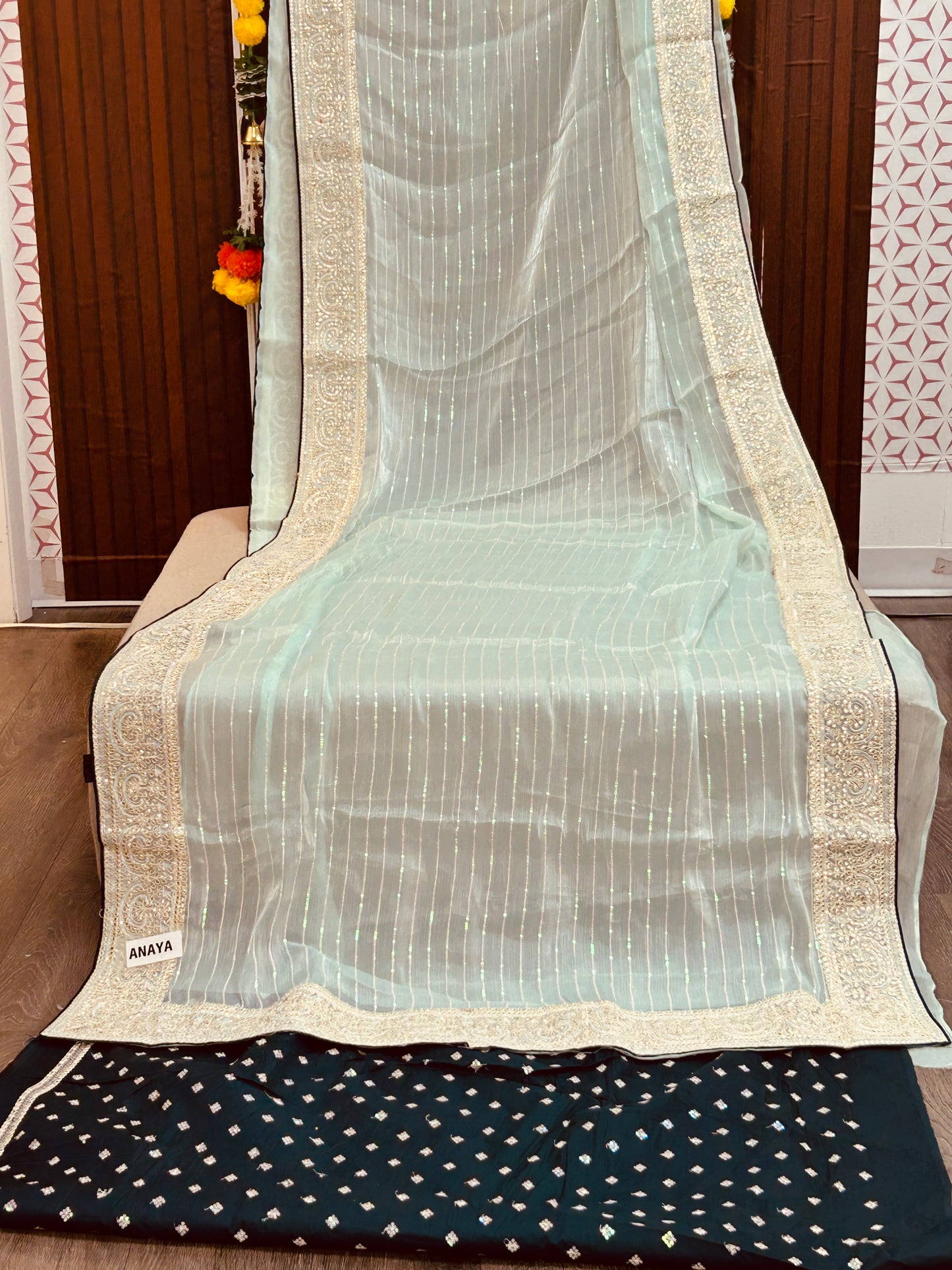 Tissue silk saree with contrast blouse piece