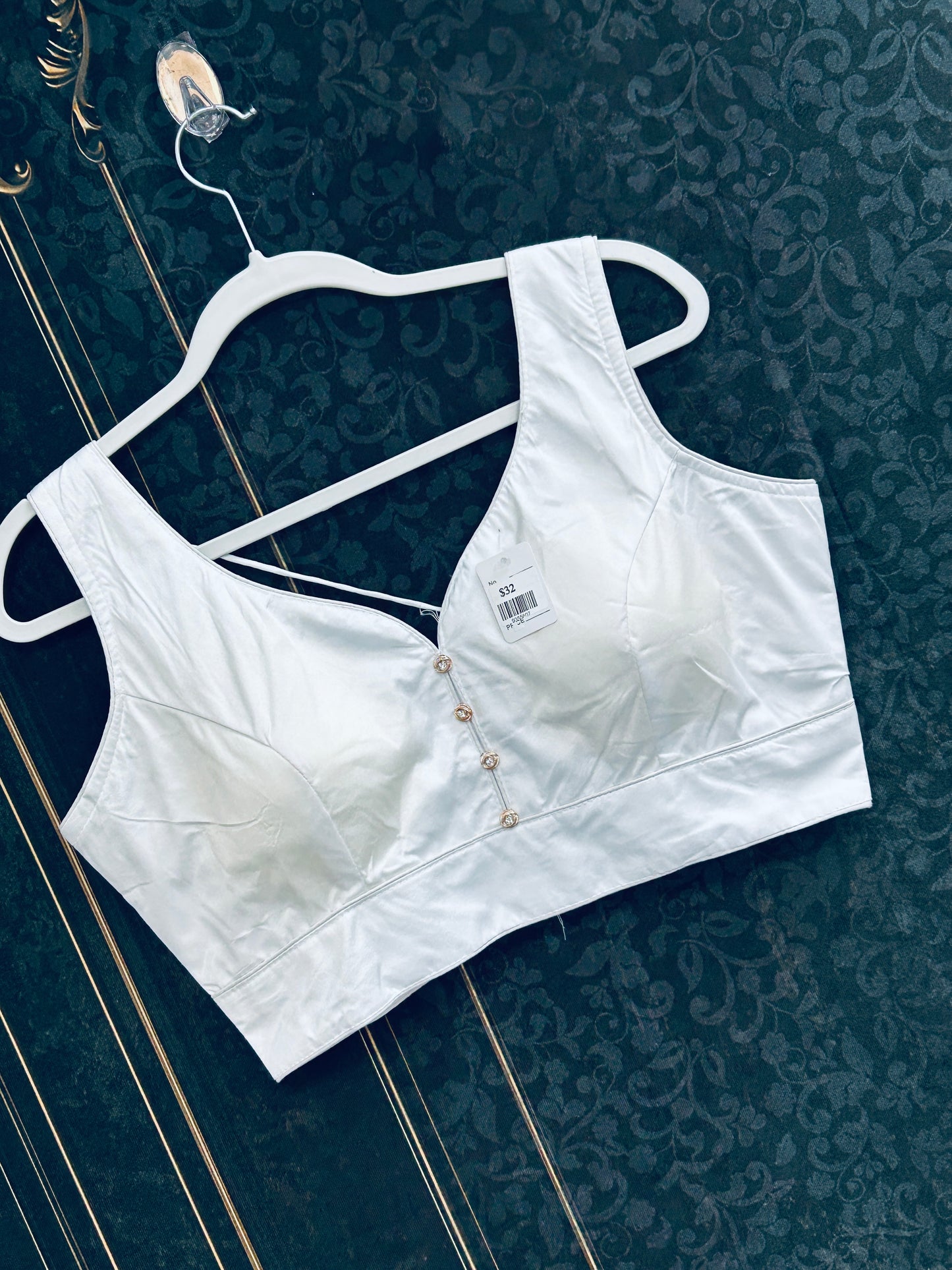 White sleeveless blouse