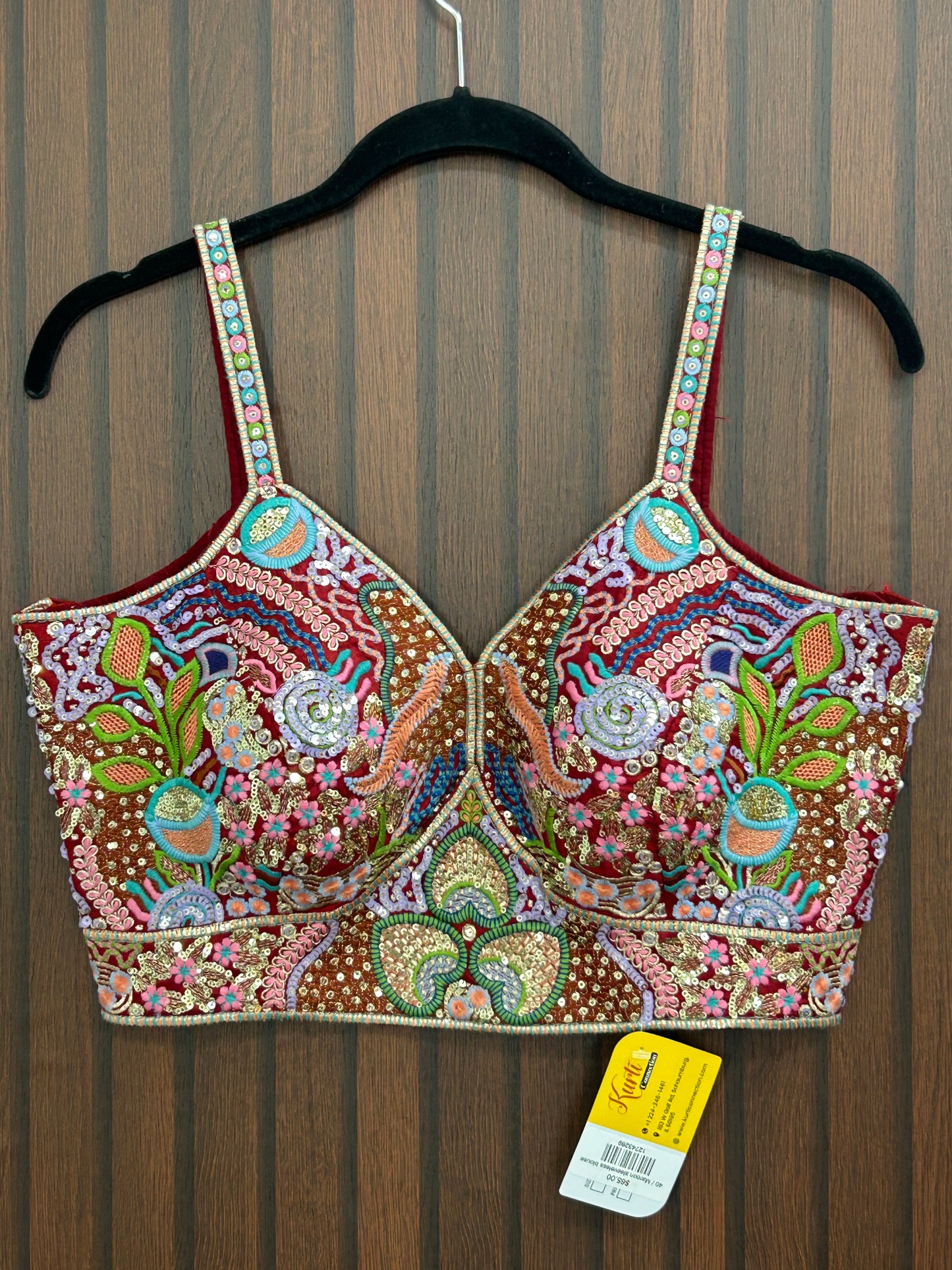 Maroon sleeveless blouse