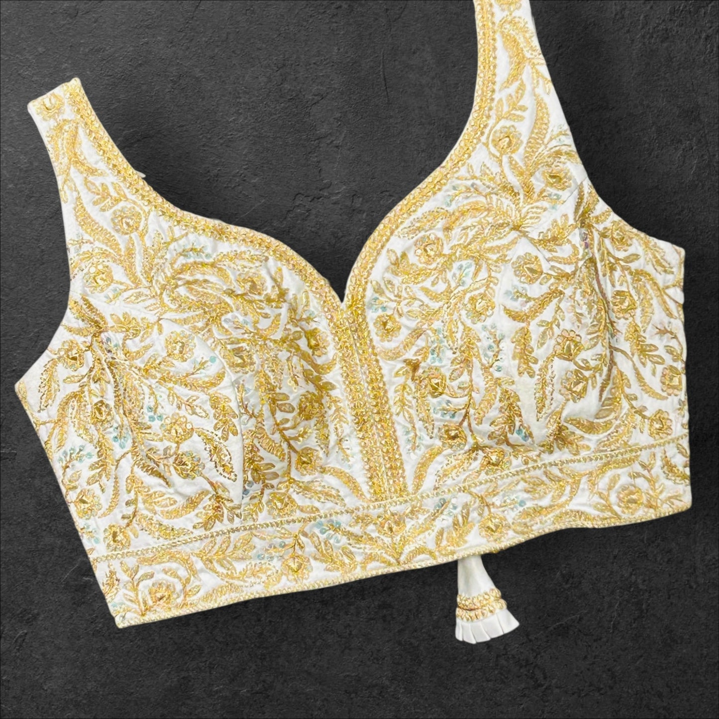 White blouse with gold embroidery