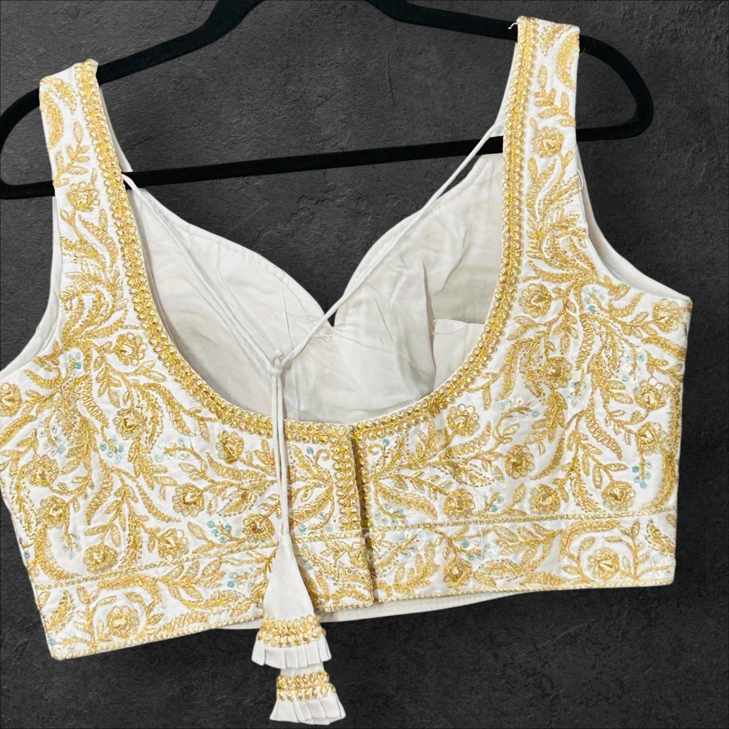 White blouse with gold embroidery