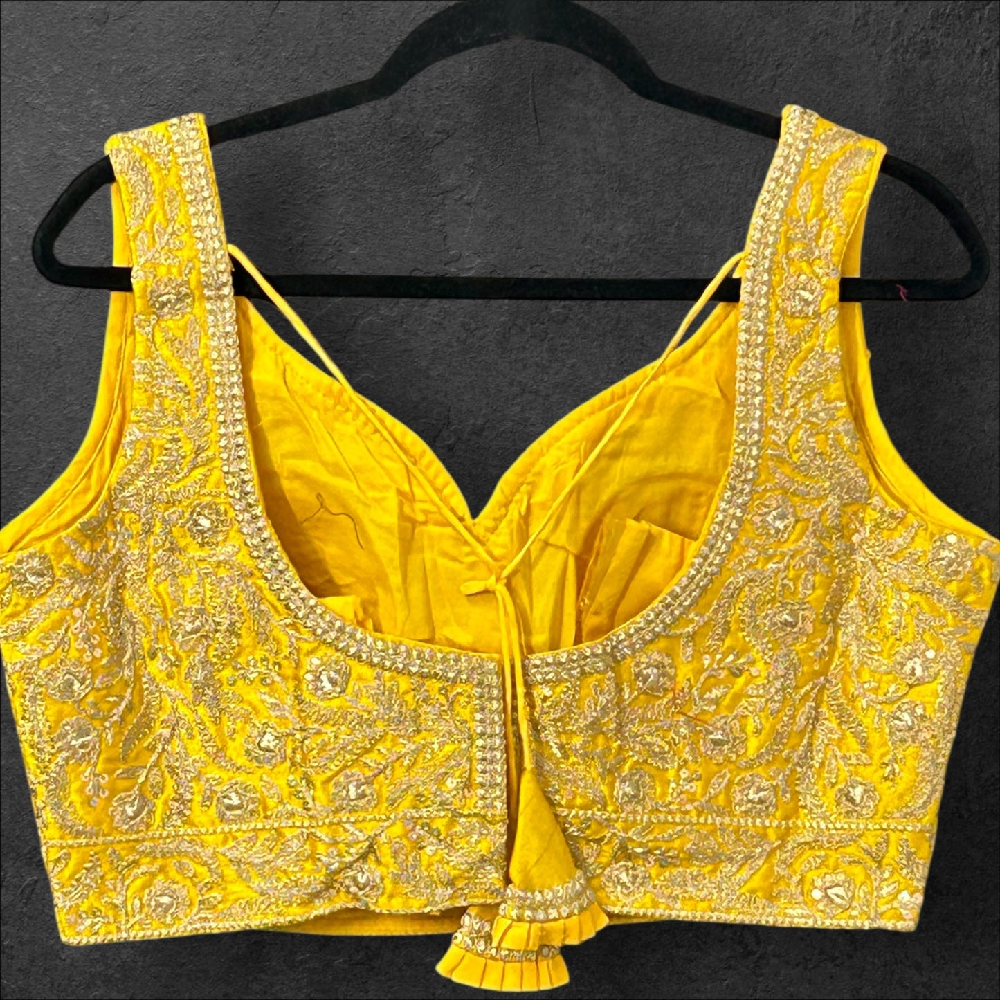 Yellow blouse with gold embroidery