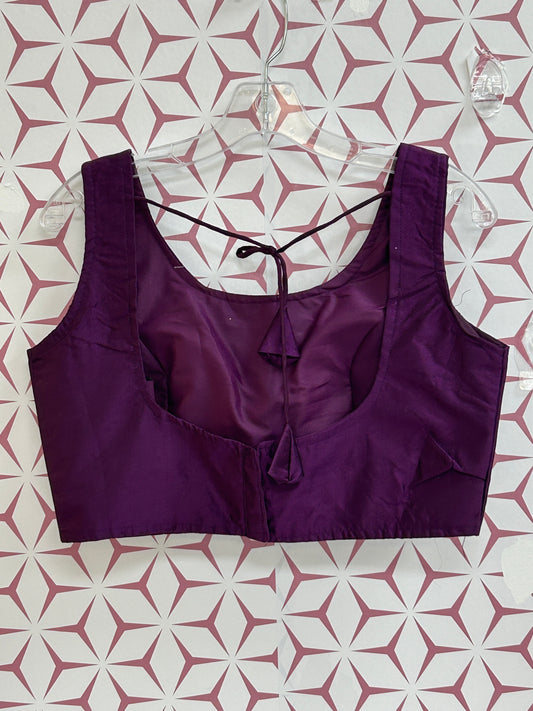 Purple sleeveless blouse