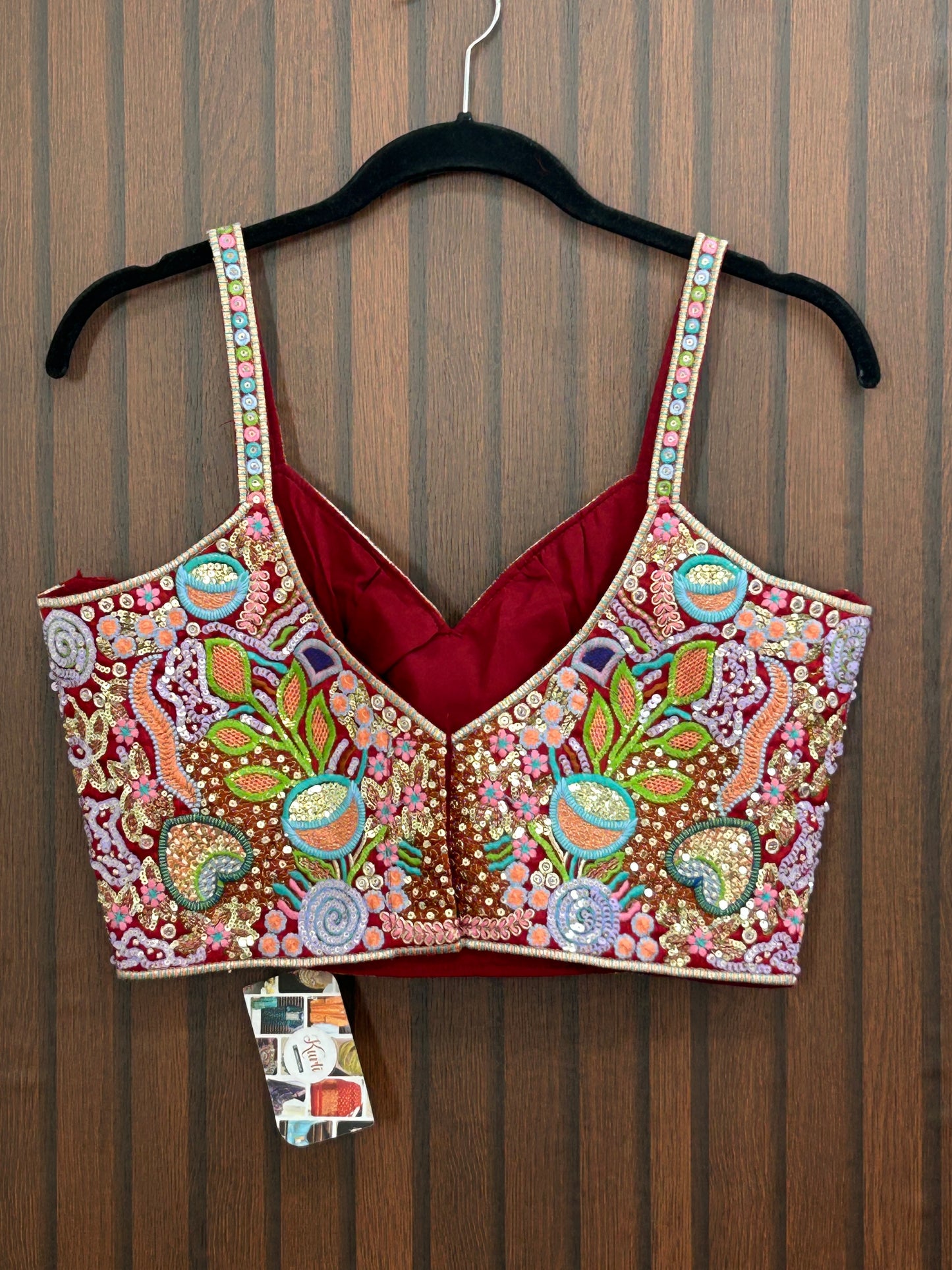 Maroon sleeveless blouse