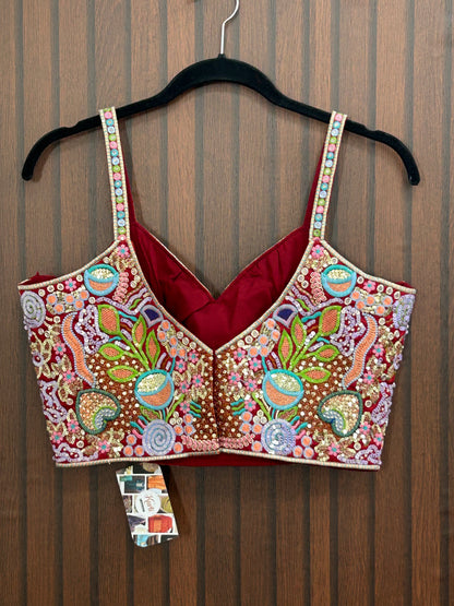 Maroon sleeveless blouse