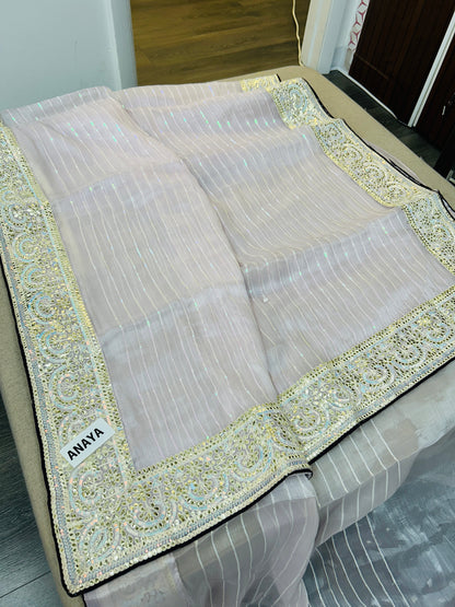Tissue silk saree with contrast blouse piece