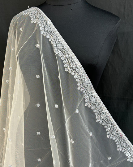 Off white net dupatta with silver sequin border