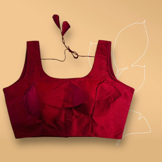 Red sleeveless blouse