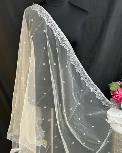 Off white net dupatta with silver sequin border