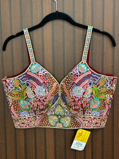 Maroon sleeveless blouse