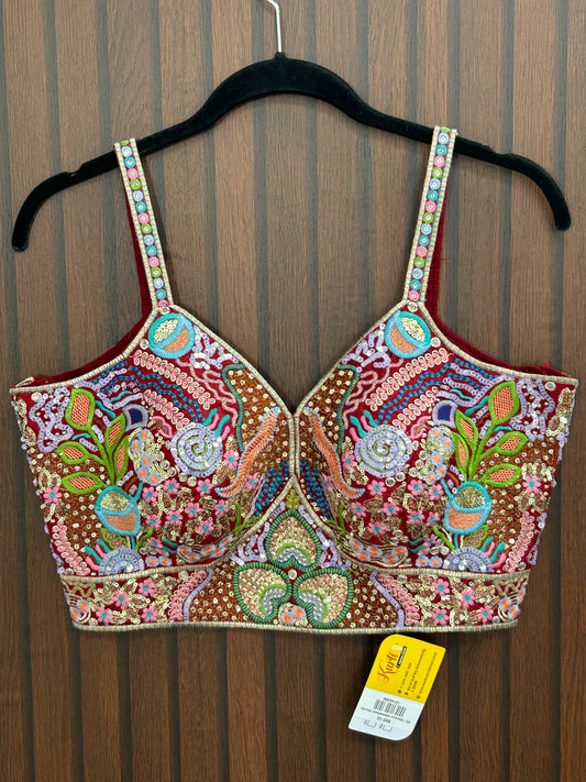Maroon sleeveless blouse