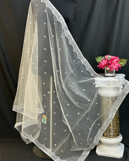 Off white net dupatta with silver sequin border