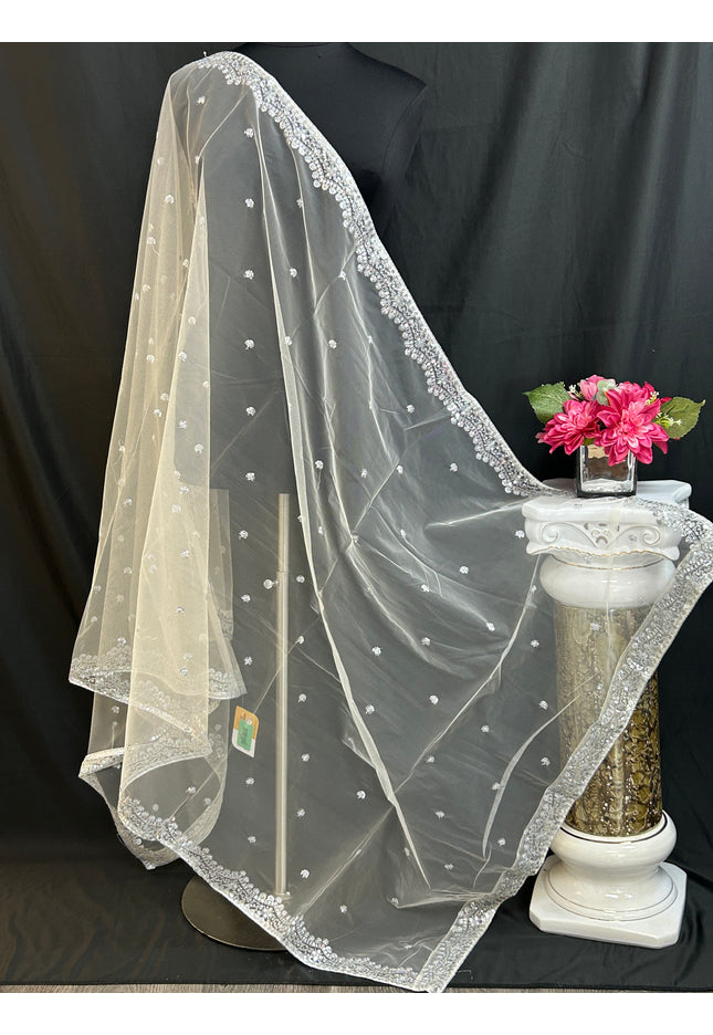 Off white net dupatta with silver sequin border