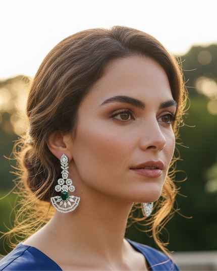 AD earrings with emerald green stone