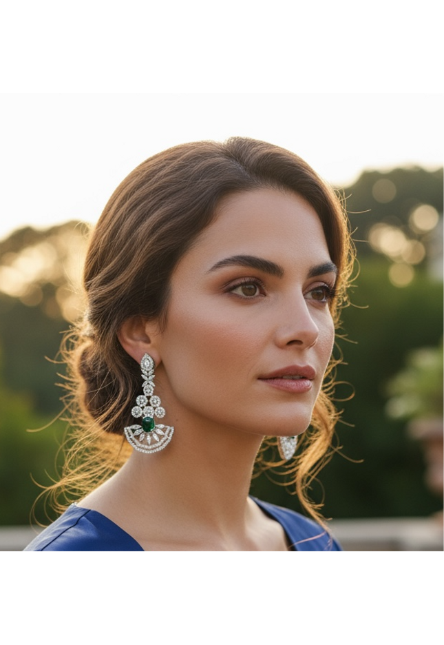 AD earrings with emerald green stone