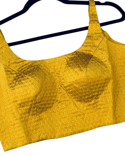 Mustard yellow sleeveless blouse