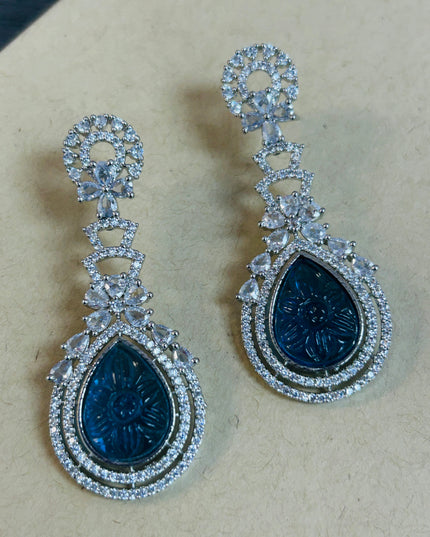 Light blue carved stone earrings