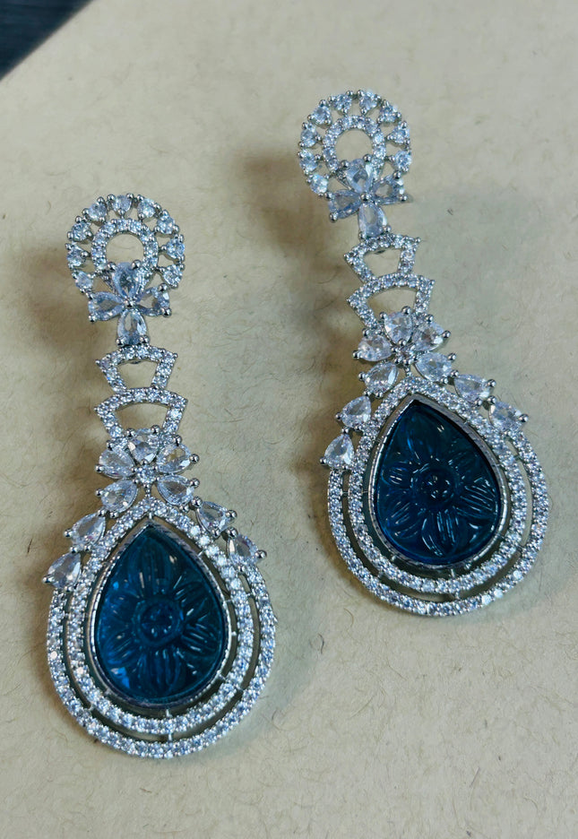 Light blue carved stone earrings