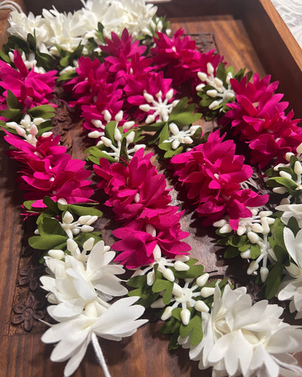 Gajra: Immitation flower strings , hair accessories