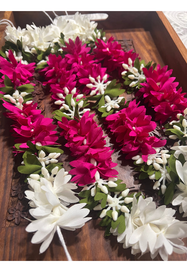 Gajra: Immitation flower strings , hair accessories