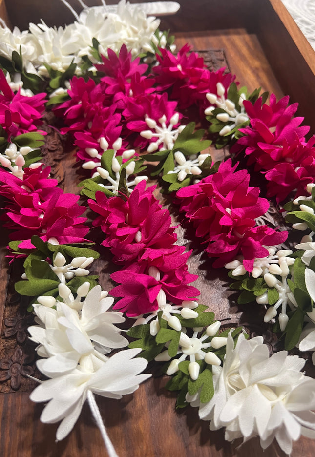 Gajra: Immitation flower strings , hair accessories