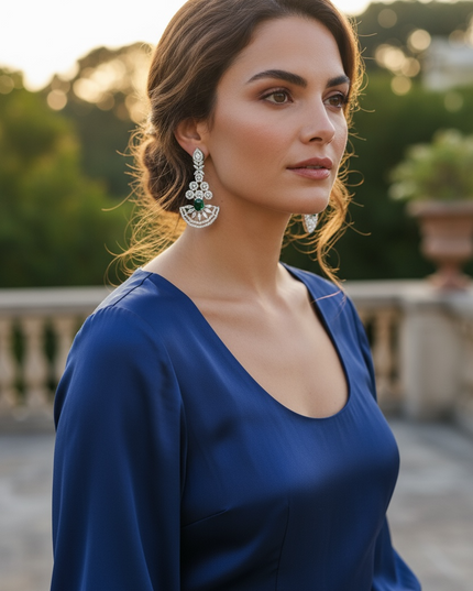AD earrings with emerald green stone