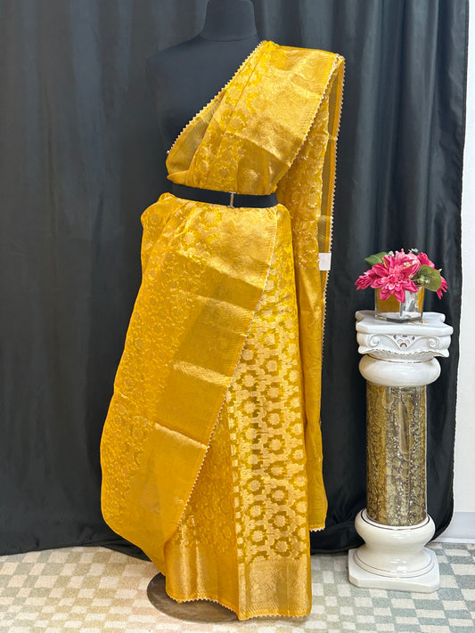 Tissue organza saree with all over jari weaving