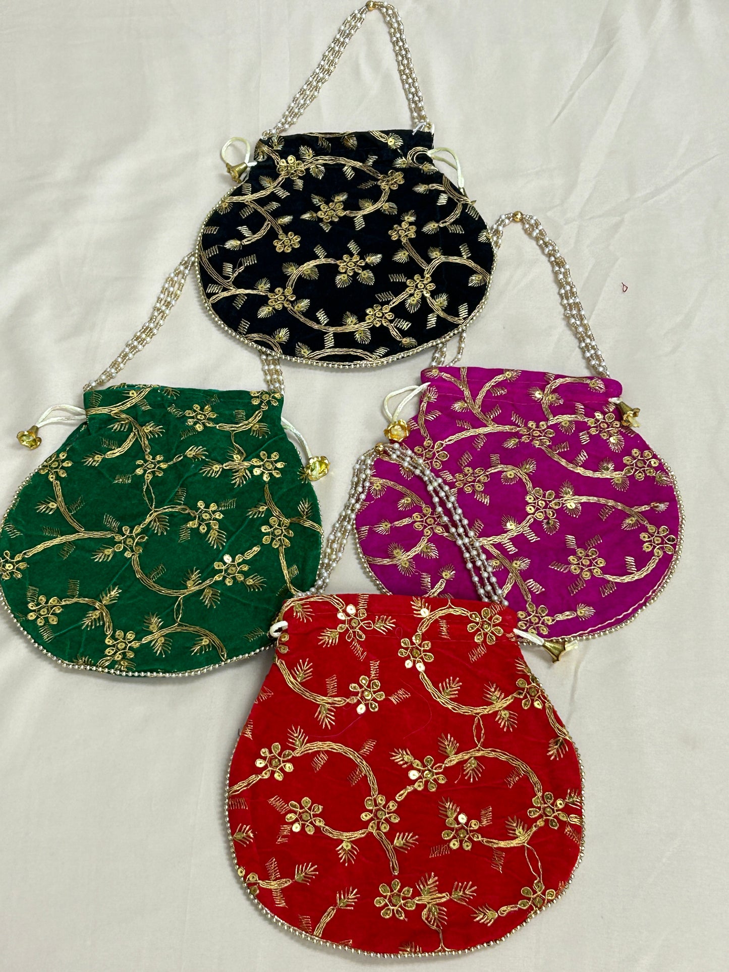 Embroidered potli bags by Kurti Connection USA