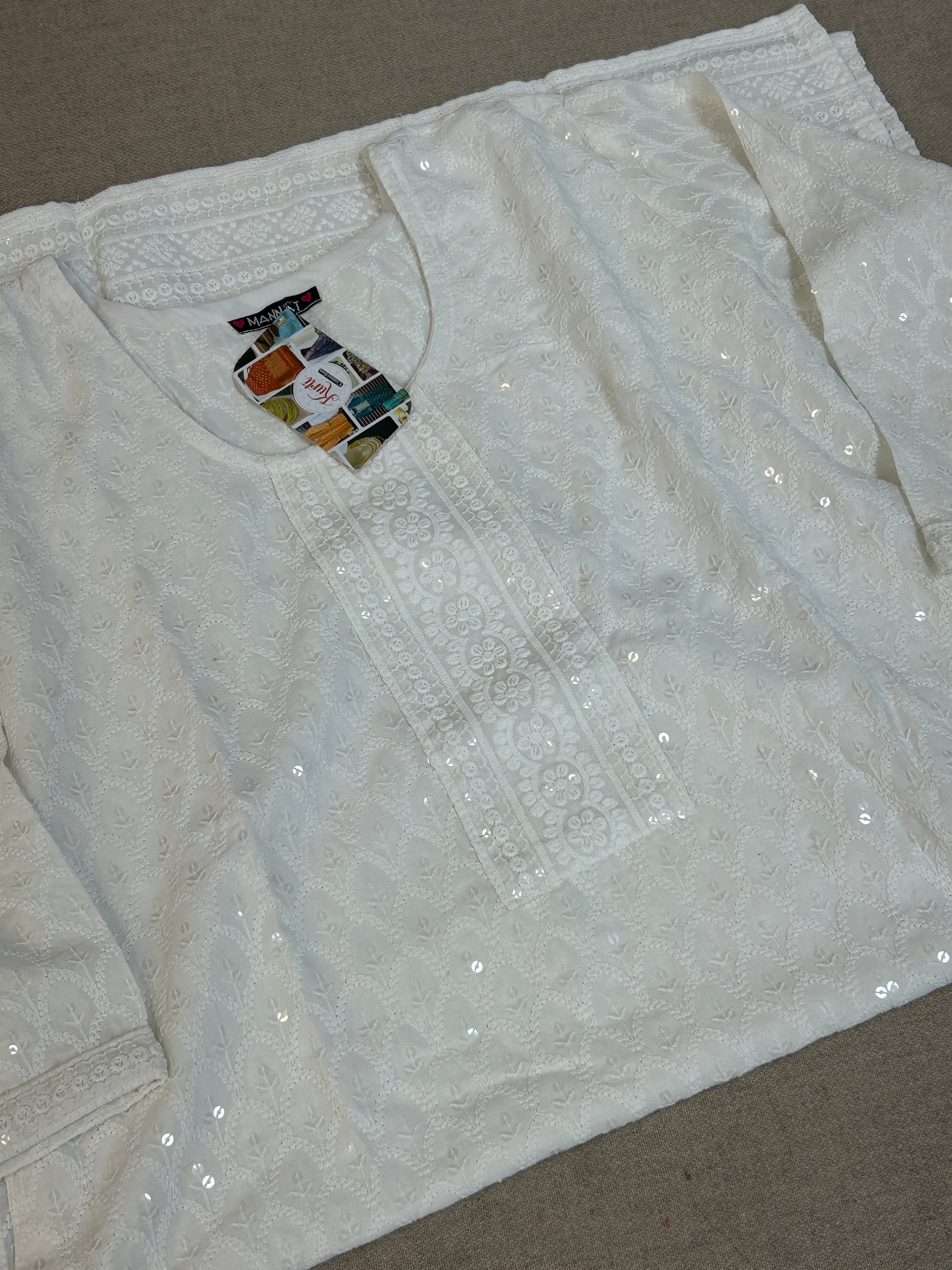 White chikankari kurti with light sequin work by Kurti Connection USA