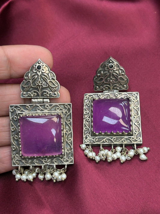 Silver look alike earrings