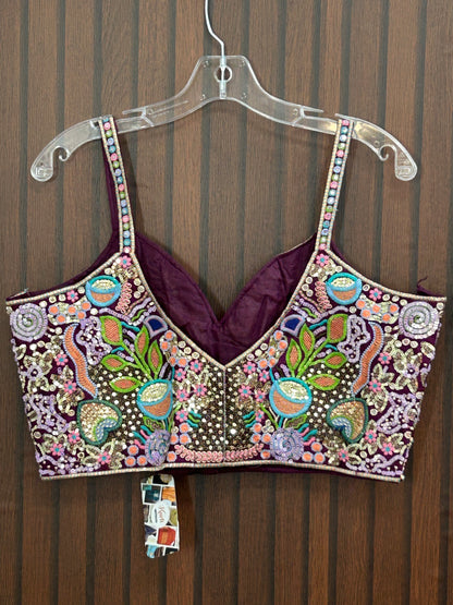 Purple sleeveless blouse