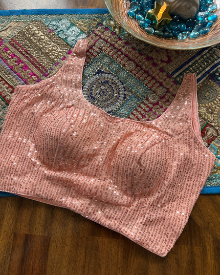 Peach sequin blouse