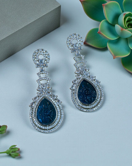 Light blue carved stone earrings