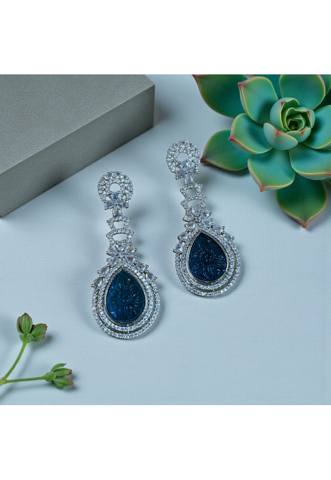 Light blue carved stone earrings