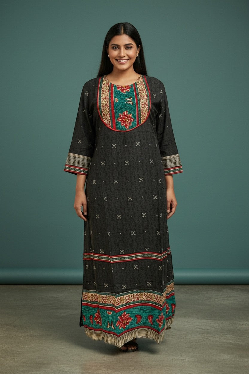 Kurti Connection USA black maxi dress with embroidered neckline and hem, featuring a subtle all-over print and contrasting border details.