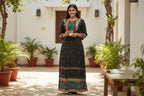 Kurti Connection USA black maxi dress with embroidered neckline and hem, featuring a subtle all-over print and contrasting border details.