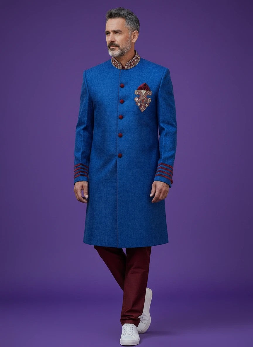 Kurti Connection USA blue sherwani jacket with red velvet accents, mandarin collar, and intricate chest embroidery.