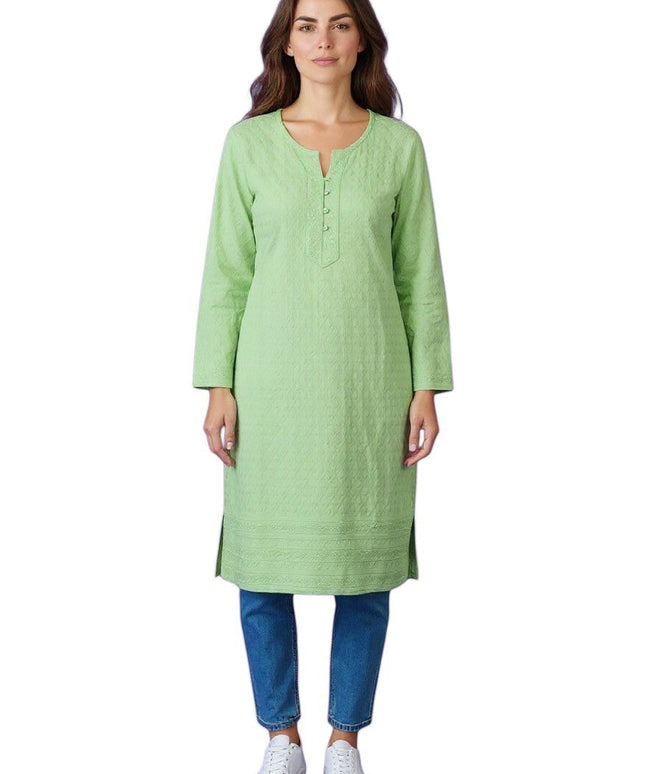 Kurti Connection USA light green textured cotton Chikankari kurti with button placket and side slits, worn by a woman with blue jeans.