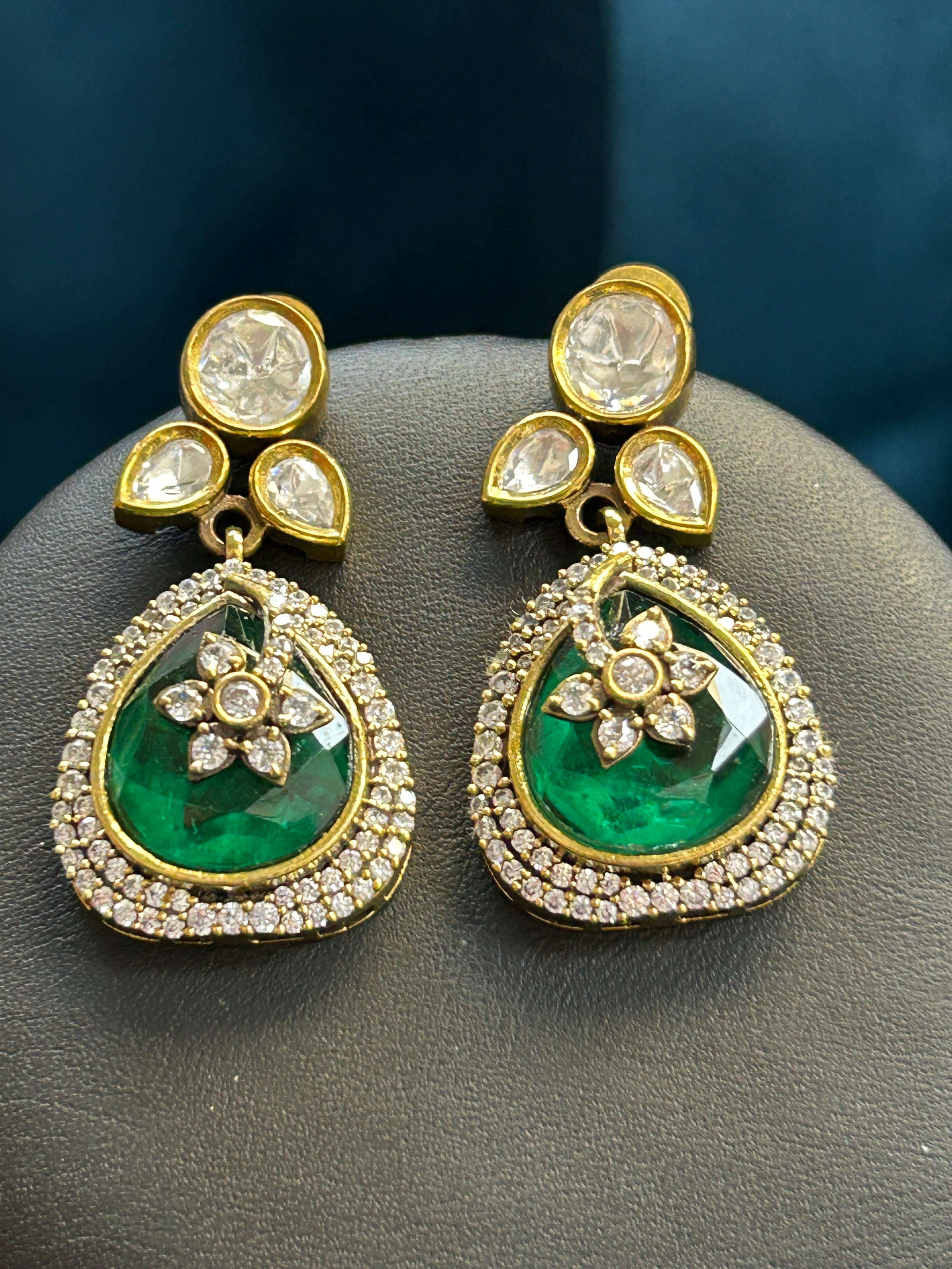 Kurti Connection USA elegant green teardrop drop earrings with white crystal halo and floral motif in gold setting