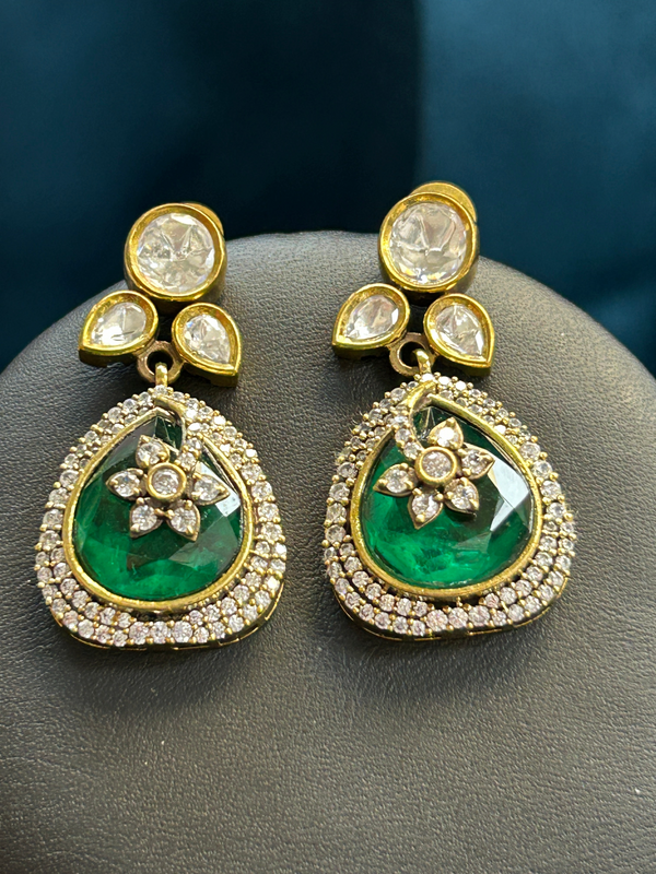 Kurti Connection USA elegant green teardrop drop earrings with white crystal halo and floral motif in gold setting