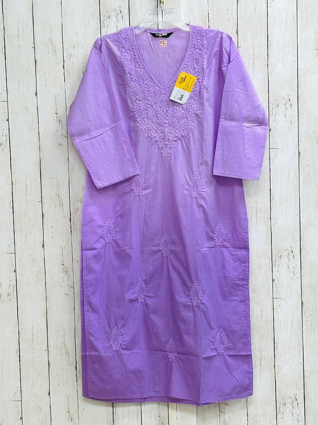 Kurti Connection USA lavender cotton tunic with white floral embroidery, V-neckline, and three-quarter sleeves.