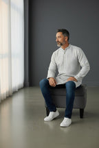 Kurti Connection USA men's light grey kurta shirt with subtle geometric pattern, mandarin collar, and button placket.