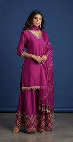 Kurti Connection USA magenta silk sharara suit with gold embroidery on neckline, cuffs, and hem. Includes matching dupatta.