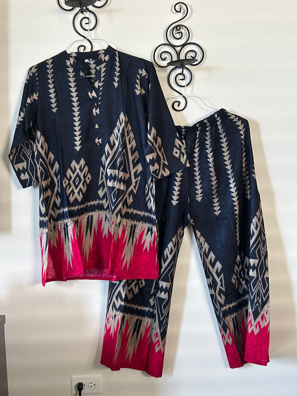 Kurti Connection USA navy tunic and trouser set with beige geometric patterns and vibrant pink hem accents.