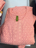 Kurti Connection USA peach kurti top with all-over leaf embroidery and textured front panel. Relaxed fit, round neckline.