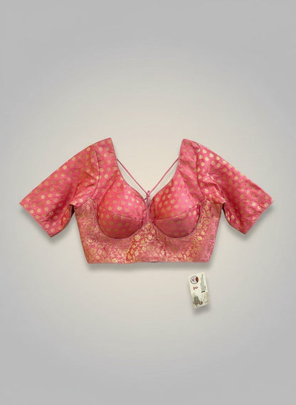 Kurti Connection USA pink brocade blouse with gold floral pattern and criss-cross back straps.