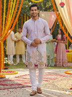 Kurti Connection USA light purple silk kurta set with intricate embroidery of peacocks and deer, paired with white pajamas.