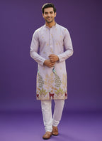 Kurti Connection USA light purple silk kurta set with intricate embroidery of peacocks and deer, paired with white pajama.