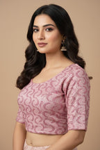Kurti Connection USA rose pink embroidered crop top blouse with scoop neckline and three-quarter sleeves.