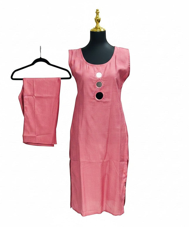 Kurti Connection USA rose textured sleeveless kurti with round neck and mirror embellishments, paired with straight-leg pants.